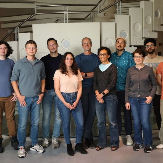 2023 members of the Lab pose in front of the MBRB stairs